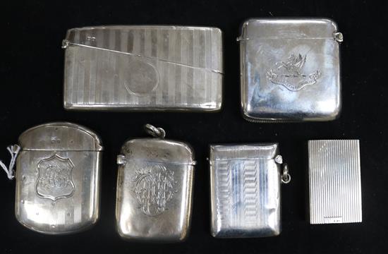 Two engine-turned silver vesta cases, a similar card case, two initialled and crested vestas and a pillbox holder, total 6.6oz